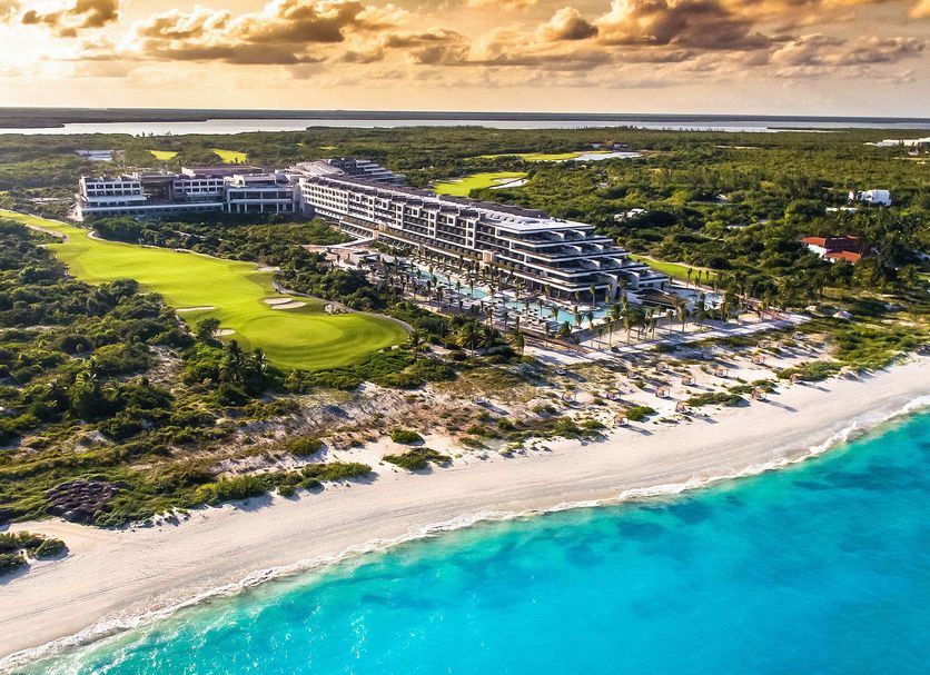 ATELIER Playa Mujeres luxury adults-only all-inclusive resort with infinity pools, contemporary architecture, and beachfront setting near Cancun.