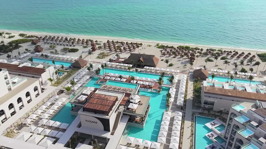 Excellence Playa Mujeres adults-only all-inclusive resort with beachfront suites and lagoon-style pools near Cancun.