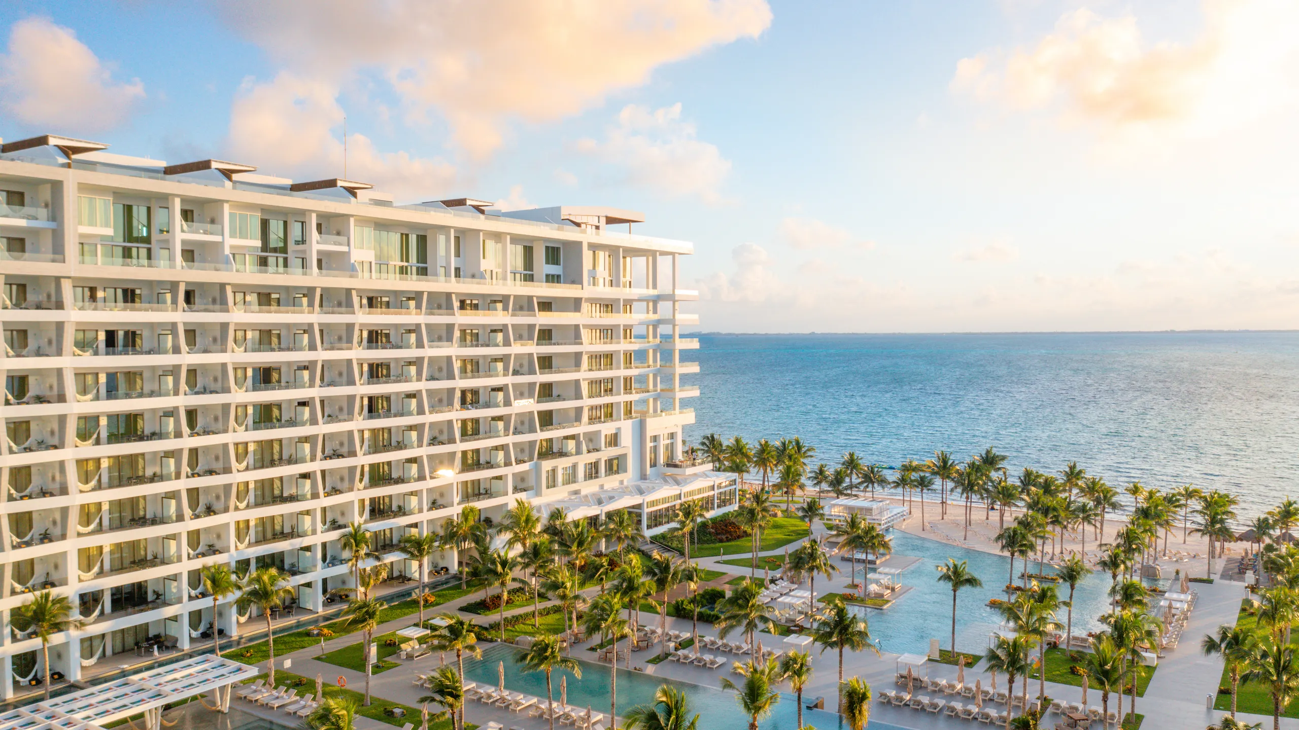 Garza Blanca Resort and Spa Cancun luxury all-inclusive with modern architecture, infinity pools, and a secluded beachfront setting.