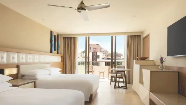Resort View Double room with two double beds and private balcony overlooking the resort grounds at Hyatt Ziva Cancun.