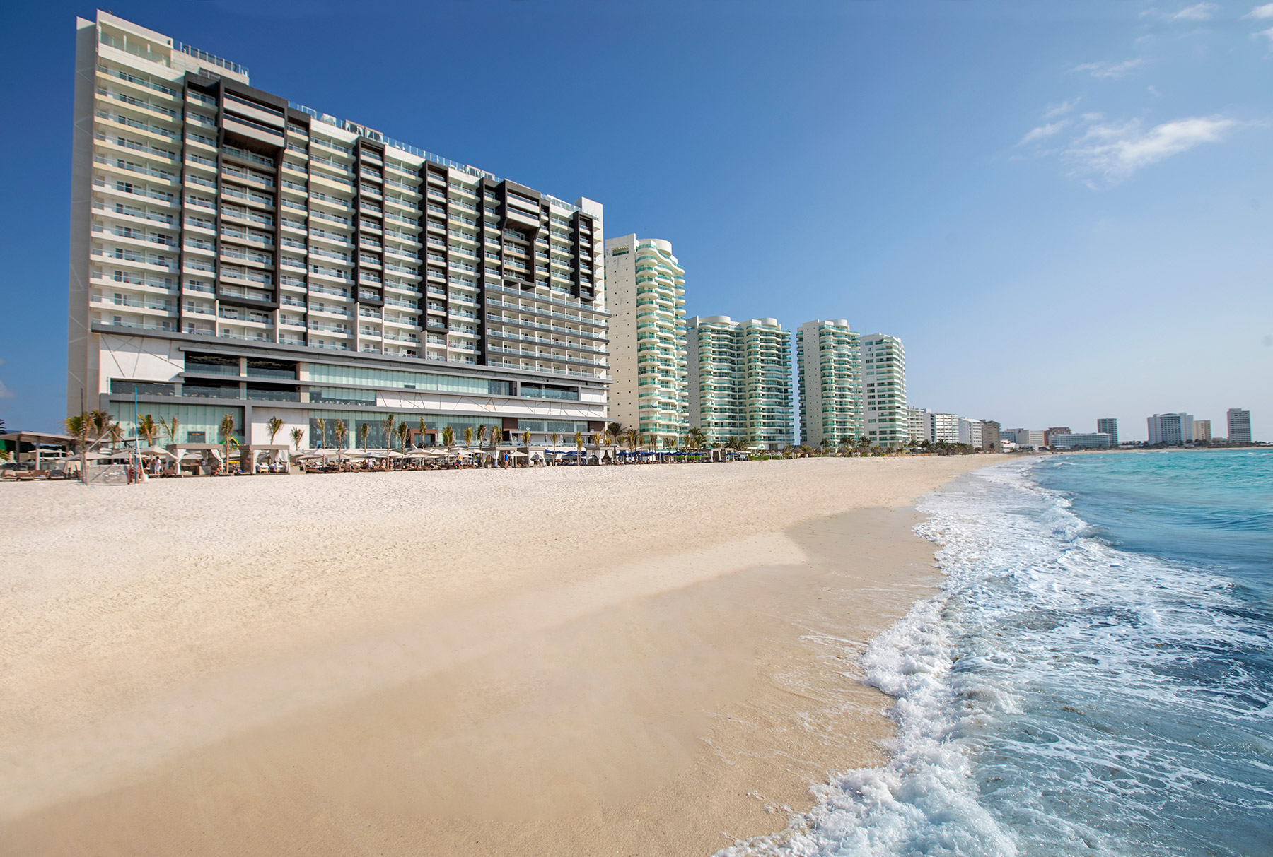 Royalton CHIC Cancun adults-only all-inclusive resort with rooftop events and modern beachfront design.