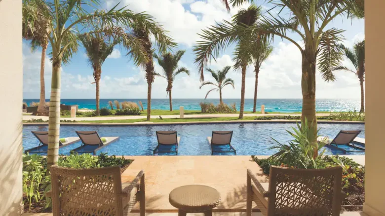 Swim-Up Double room with direct pool access, ocean views, and furnished terrace at Hyatt Ziva Cancun.
