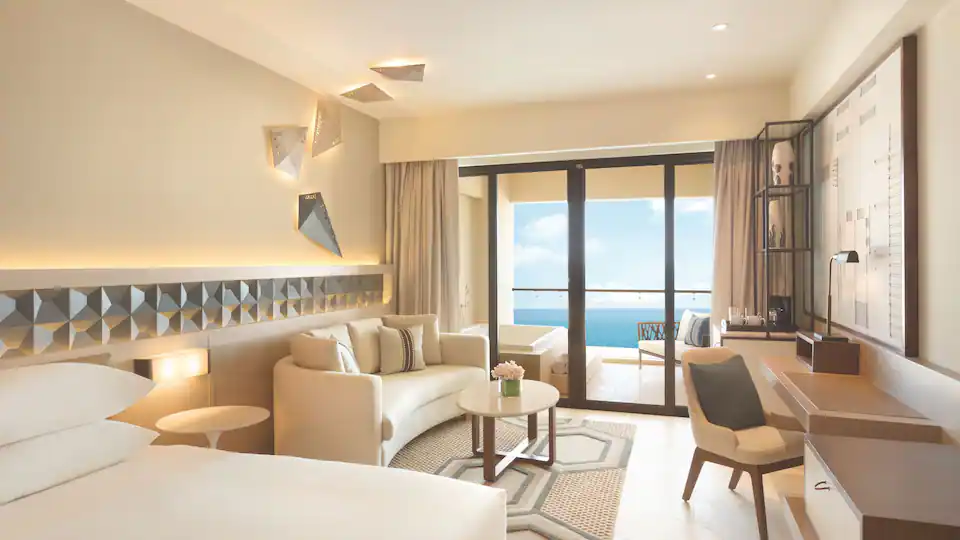 Turquoize Sky Oceanfront Master Double suite with two queen beds, private balcony, and ocean views at Hyatt Ziva Cancun.