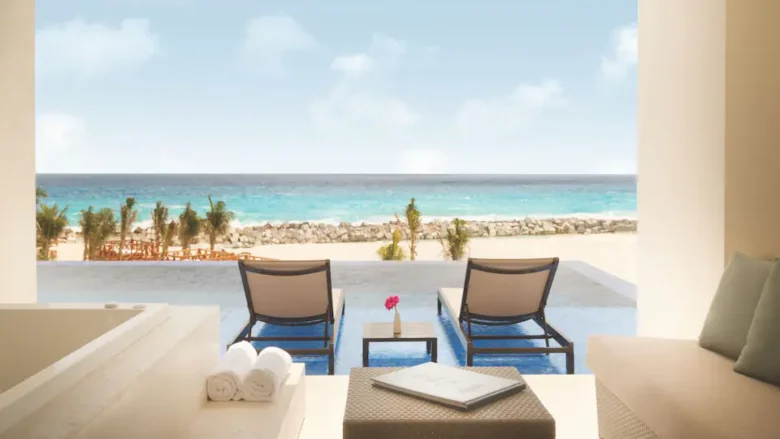 Turquoize Sky Swim-Up Oceanfront Master King suite with semi-private infinity pool and Caribbean Sea views at Hyatt Ziva Cancun.